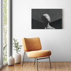 Mount Human framed print in minimalist room with orange accent chair and wooden sideboard