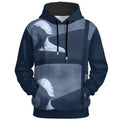 Split face design with geometric blocking in monochrome and deep navy tones on statement hoodie