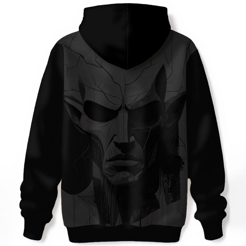 Dark cracked skull with fragmented porcelain texture and deep shadows on black hoodie